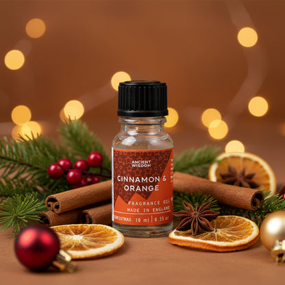 10ml Xmas Cinnamon & Orange Fragrance Oil presented against a warm backdrop, making it an excellent choice for a festive fragrance this holiday season. A great option for a pamper pack, it brings the essence of winter spice into your home with its inviting scent.