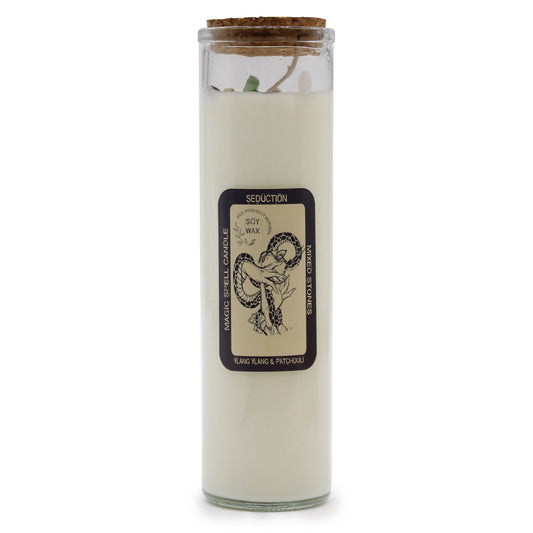 Seductive Spell Candle with Gemstones - Ylang Ylang & Patchouli in a clear glass container with a cork lid, showcasing a luxurious design. Ideal for creating a soothing atmosphere, this enchanting scent is perfect as a Christmas gift home fragrance.