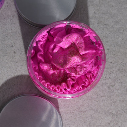 Overhead view of Pink Charlotte Whipped Cream Soap 120g in a clear jar, highlighting its beautiful pink colour and texture. An exquisite {{scent}} {{product_type}} – Christmas gift home fragrance for the festive season.