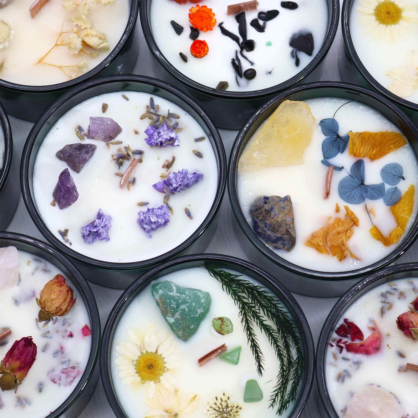 Collection of Hop Hare Magical Flower Candles, showcasing various scents including the Jasmine Garden Scent. Perfect as a Christmas gift home fragrance with their charming floral designs.