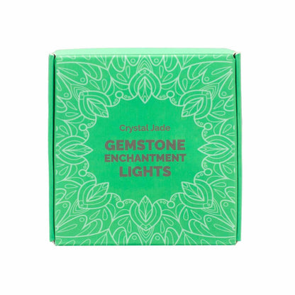 Closed packaging of Crystal Jade Gemstone Enchantment Lights, designed with elegant green patterns. An ideal choice for festive decorations and gifts for loved ones. {{scent}} {{product_type}} – Christmas Gift Home Fragrance.