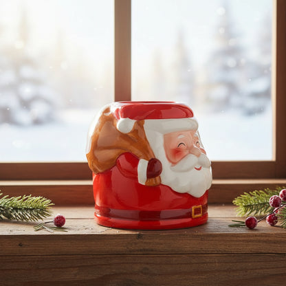 Close-up of Santa Ceramic Oil Burner – Festive Christmas Home Décor featuring its classic Santa design with a gift sack, enhancing your Christmas ambiance with home fragrance.