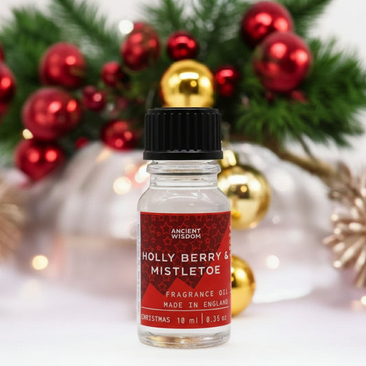 Holly Berry & Mistletoe 10ml Holiday Fragrance Oil displayed in a festive setting, perfect for creating a warm ambiance during seasonal celebrations.