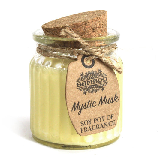 Eco-Friendly Mystic Musk Soy Wax Candle Pot in a glass jar with a cork lid, perfect for creating a warm atmosphere. Mystic Musk scent from this candle makes an ideal Christmas gift and home fragrance.