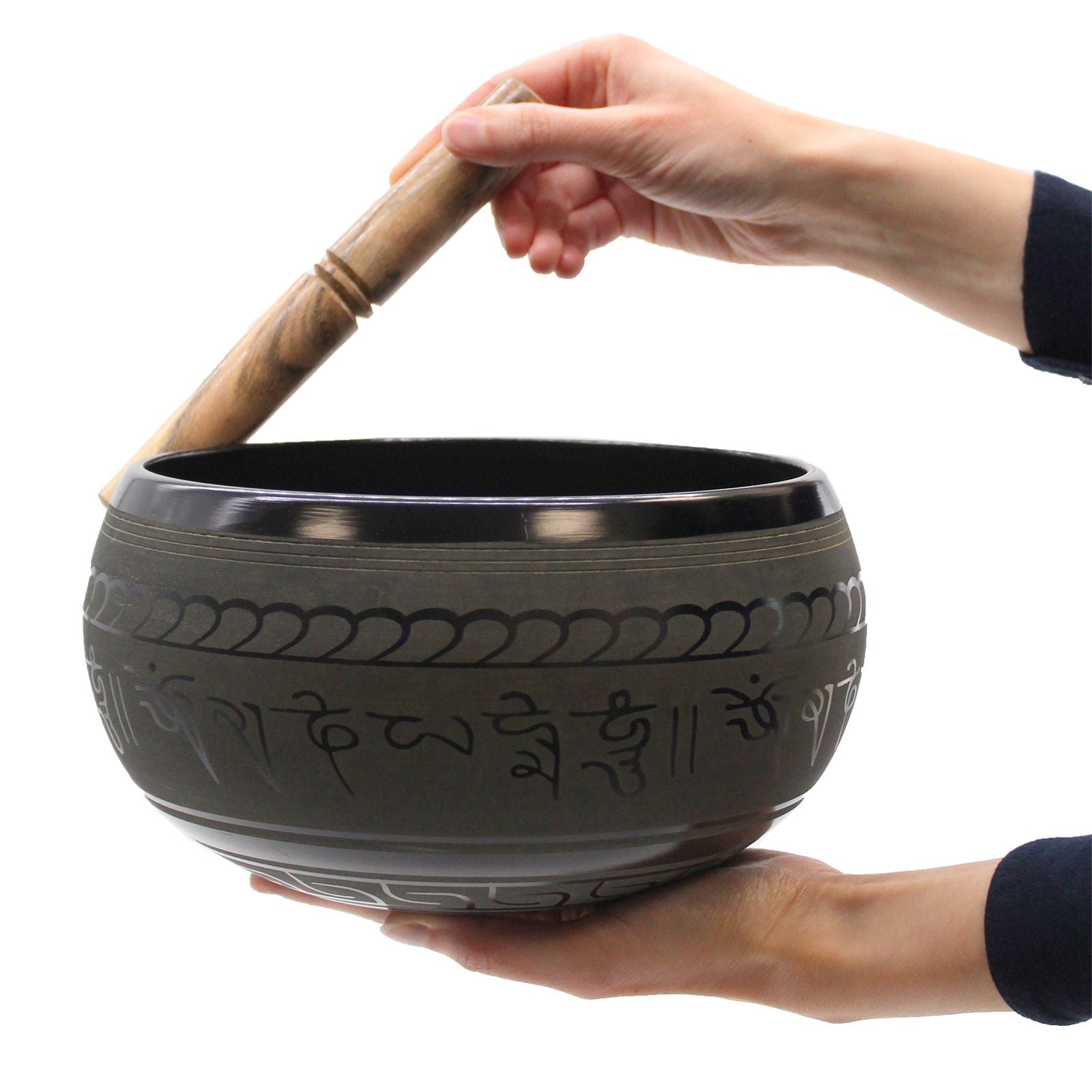 Extra Loud Singing Bowl - Buddha Design for Meditation being played with a mallet, emphasizing its resonance and sound quality. A great tool for mindfulness, perfect for gifting as a Christmas Gift Home Fragrance.