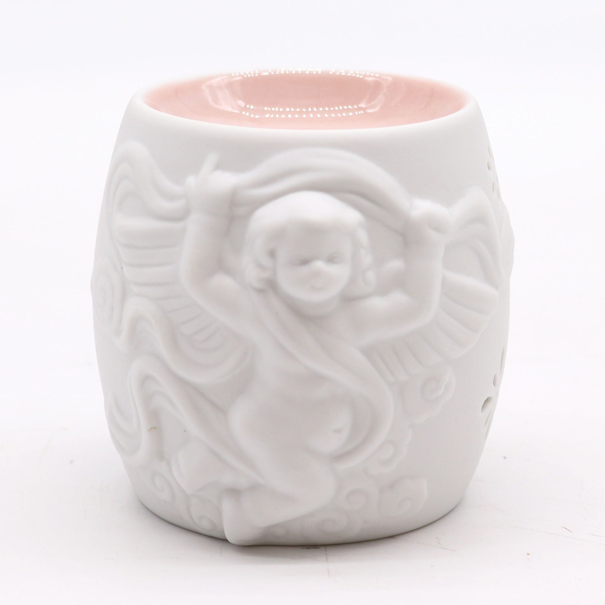 Elegant Cherubs Design Ceramic Oil Burners showcasing a charming cherub in flight. A delightful addition to your home decor, offering a warm glow as a Christmas gift for fragrance enthusiasts.