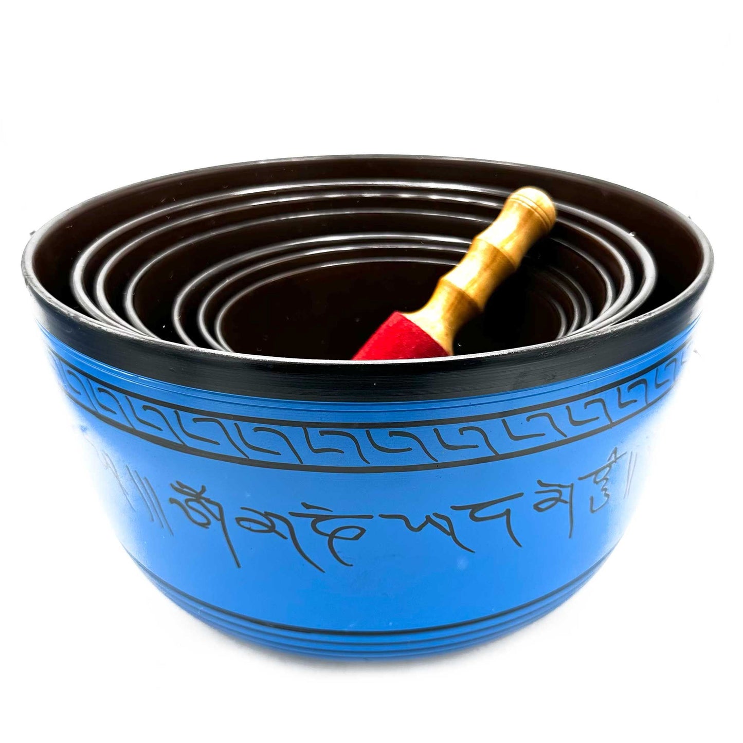 Large 7 Chakra Singing Bowls Set featuring a beautifully crafted blue singing bowl with intricate designs, perfect for relaxation and meditation in cozy homes. Ideal Christmas gift for enhancing home fragrance.