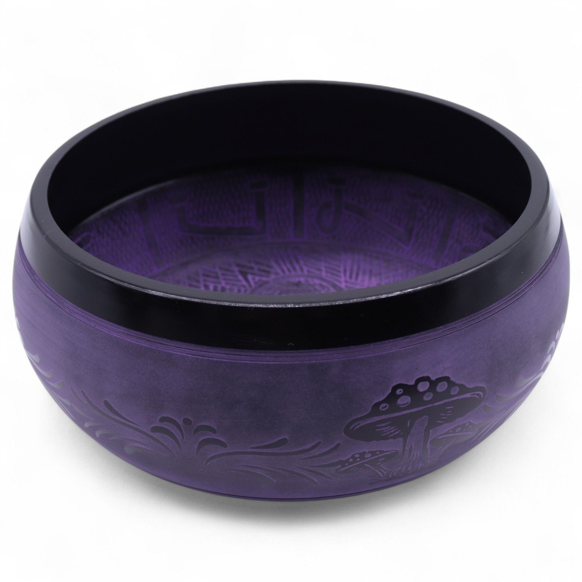 A close-up view of the Extra Loud Purple Haze Singing Bowl highlighting its artistic outer embellishments, ideal for enhancing yoga practices. This beautiful {{scent}} {{product_type}} – Christmas Gift Home Fragrance is a must-have for mindfulness.
