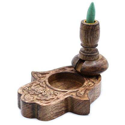 Sm Mango Wood Backflow Burner - Hamsa with an incense cone inserted, demonstrating its function as a stylish home fragrance piece. A perfect addition to your aromatherapy collection and a unique Christmas gift idea.