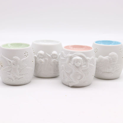 Elegant Cherubs Design Ceramic Oil Burners displaying four assorted styles with intricate cherub designs. Perfect for enhancing your living space and making a thoughtful Christmas gift for those who love home fragrances.