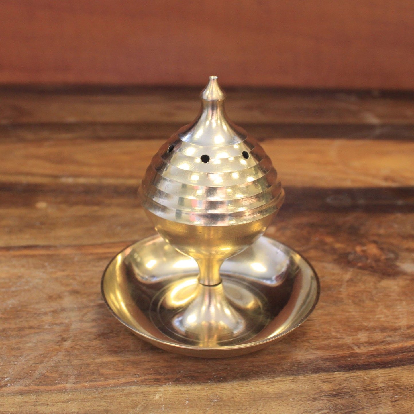 Elegant Medium Brass Incense Burner – Rituals & Meditation captured individually, reflecting its shiny surface and intricate details. This piece makes for a thoughtful Christmas Gift Home Fragrance.