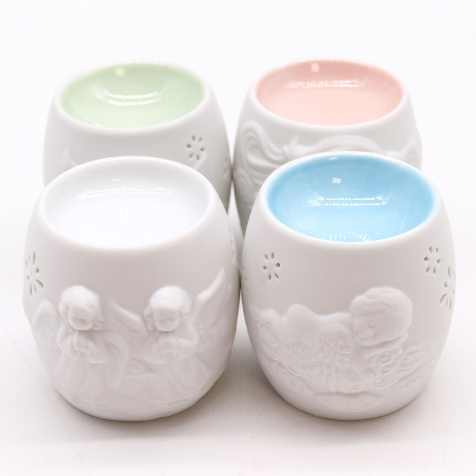 Elegant Cherubs Design Ceramic Oil Burners featuring a variety of exquisite designs, ideal for creating a lovely home ambiance. Great for gifting at Christmas, perfect for anyone who cherishes home fragrances.