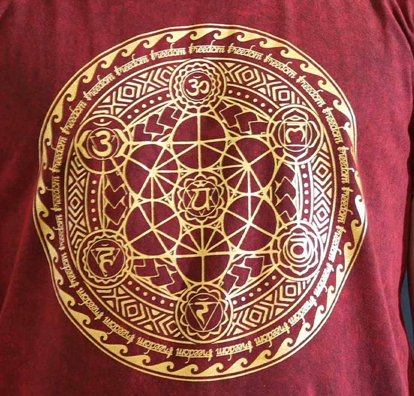 Chakra Large Maroon Stone Washed T-Shirt displayed on a mannequin, showcasing its unique design and soft texture, ideal for casual outings.