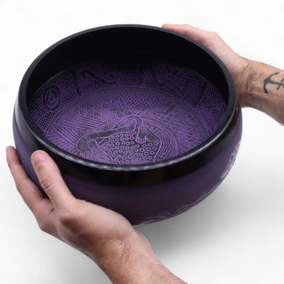 Hands holding the Extra Loud Purple Haze Singing Bowl, showcasing its intricate inner design, perfect for sound therapy. This {{scent}} {{product_type}} – Christmas Gift Home Fragrance adds a vibrant touch to meditation sessions.