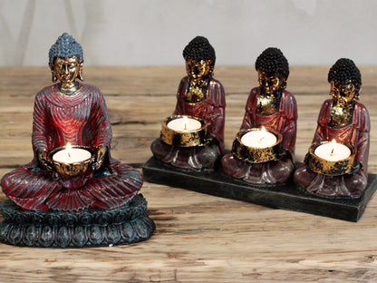 Antique Buddha Candle Holder with 3 Devotees - Zen Home Decor showcasing a serene Buddha surrounded by three devoted followers, ideal for creating a calming atmosphere in your space. This product makes a unique Christmas gift home fragrance addition.
