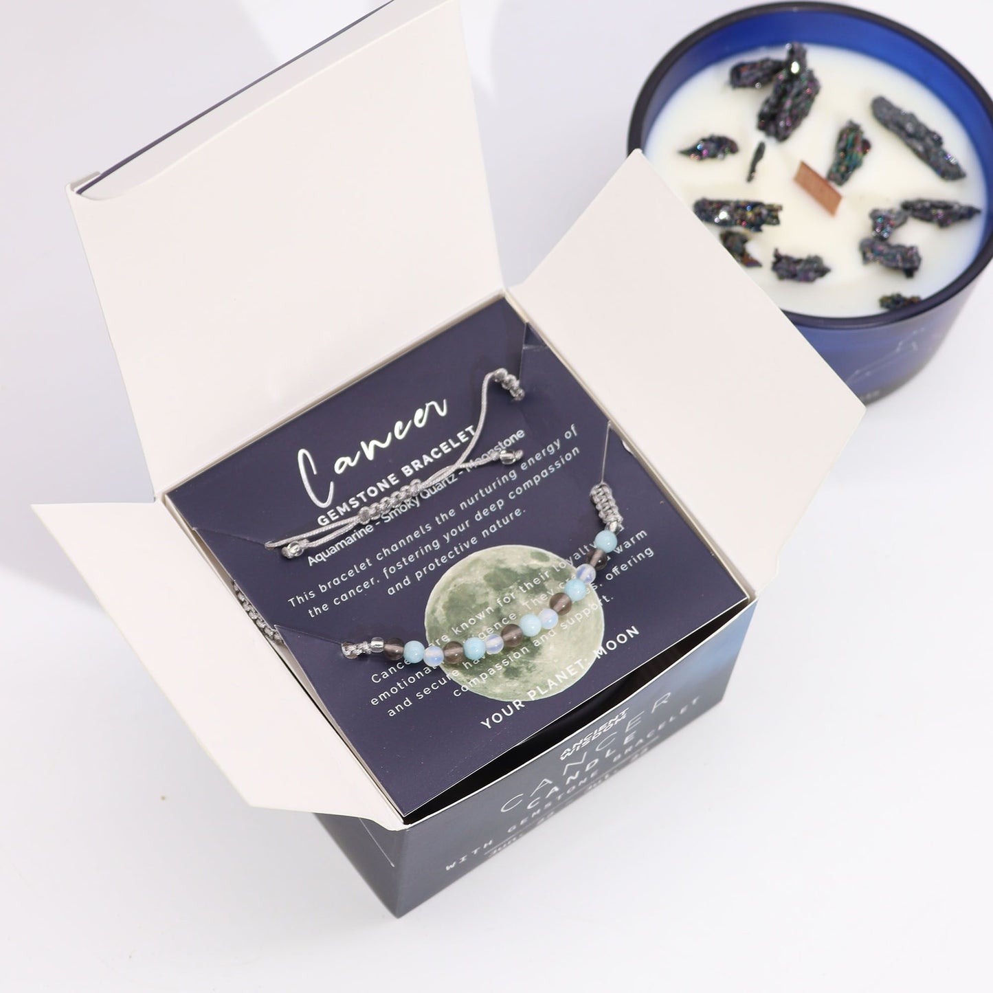 Zodiac Crystal Candle with Gemstone Bracelet - Cancer displayed in an open box, showcasing the bracelet and packaging, perfect as a Christmas Gift Home Fragrance infused with Moonstone Eclipse.