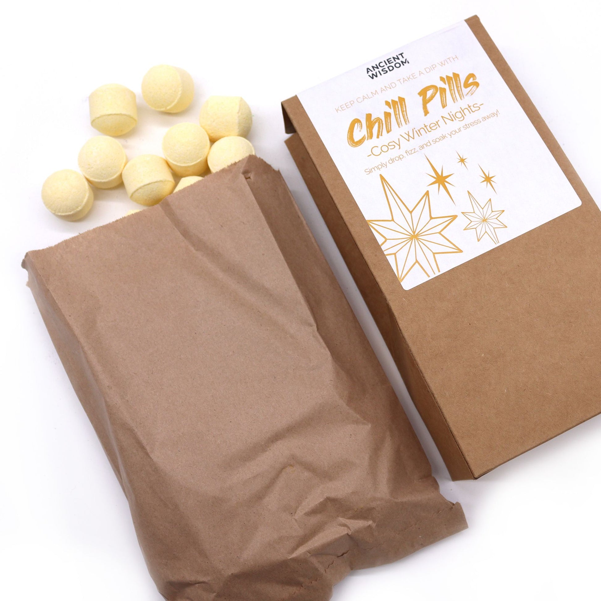 Open Cinnamon Clove Chill Pills Gift Pack 350G showcasing festive bath bombs spilling out, perfect for soothing relaxation. An enchanting {{scent}} product type, this is a great choice for Christmas Gift Home Fragrance.