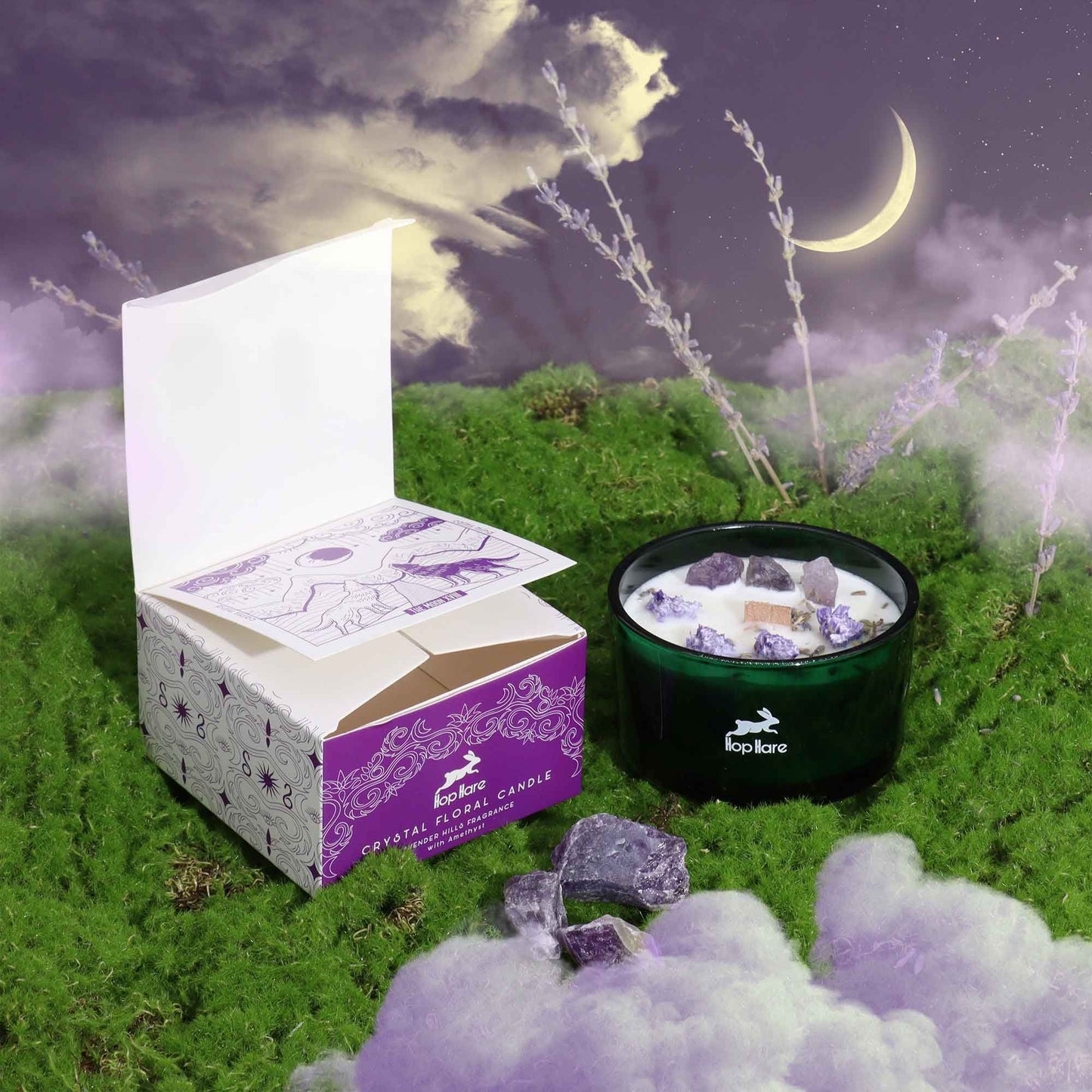 Amethyst Lavender Magic Flower Candle beautifully presented with its box, surrounded by ethereal mist and a crescent moon, perfect for creating a calming atmosphere. This scented candle serves as a stunning Christmas Gift Home Fragrance.