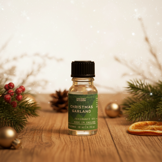 Christmas Garland Fragrance Oil 10ml bottle showcasing its festive aroma for home and gifts, ideal Christmas fragrance oil.