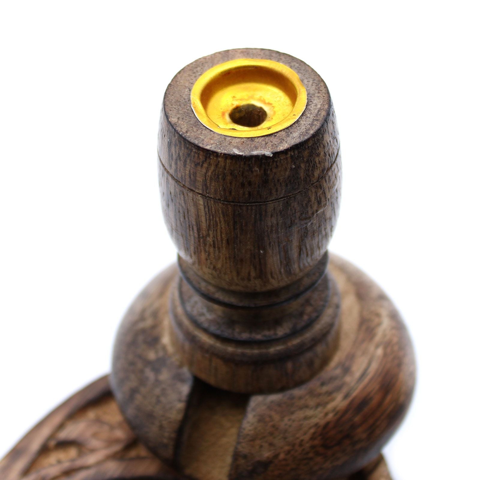 Detailed view of the top of the Sm Mango Wood Backflow Burner - Ohm, highlighting the golden hole for placing incense cones. A perfect addition to any aromatic setup. {{scent}} {{product_type}} – Christmas Gift Home Fragrance.