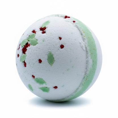 Holly Berry & Mistletoe Christmas Bath Bomb fizzing in water, creating a winter wonderland effect and enriching the bath with skin-loving properties of moisturizing bath bombs.