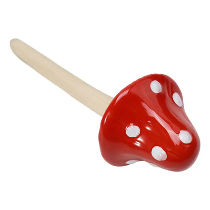 Hand-made clay mushroom from the whimsical garden decor collection, adding charm and personality to your garden.