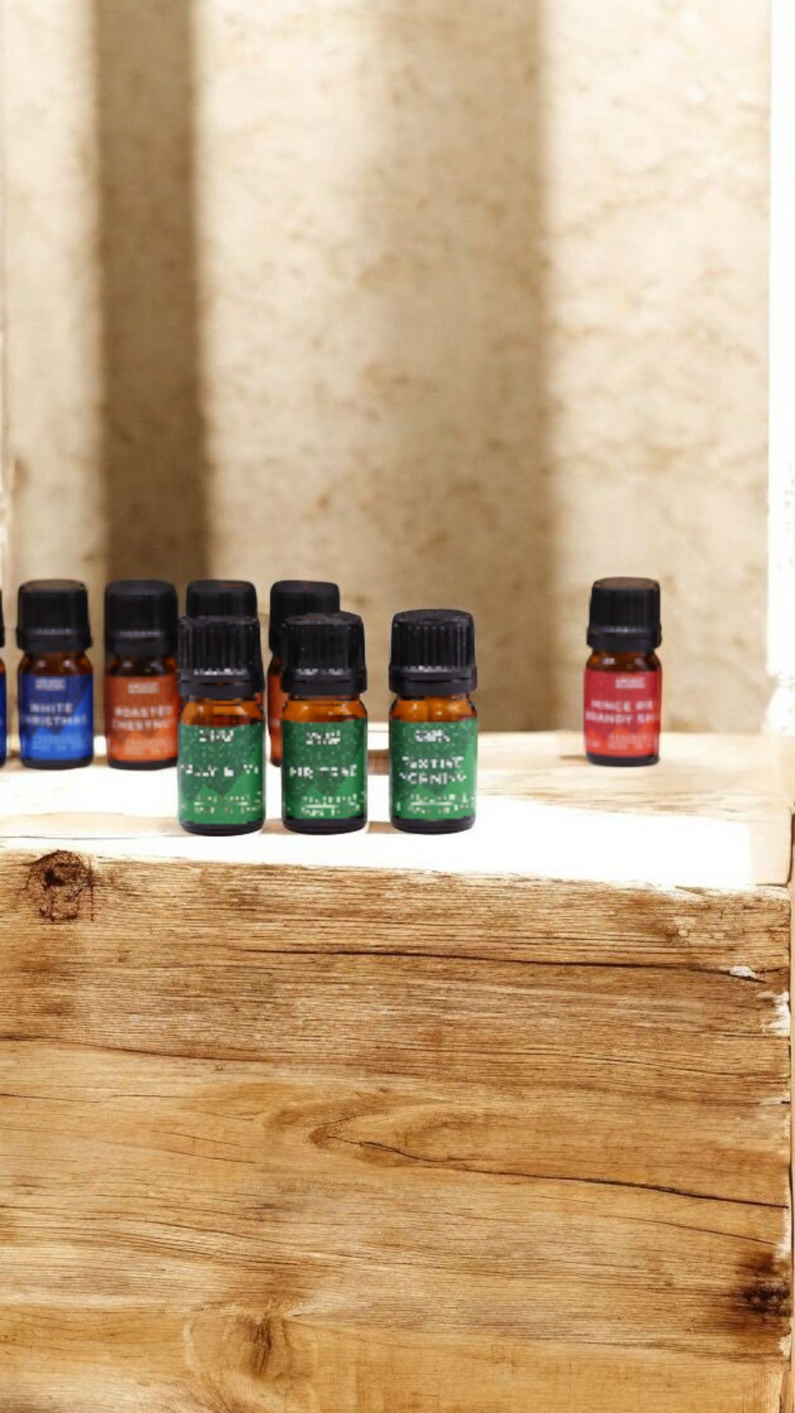 12 Unique Holiday Fragrance Oils Set packaging by AW Dropship UK, a perfect Christmas gift featuring delightful holiday fragrance oils.