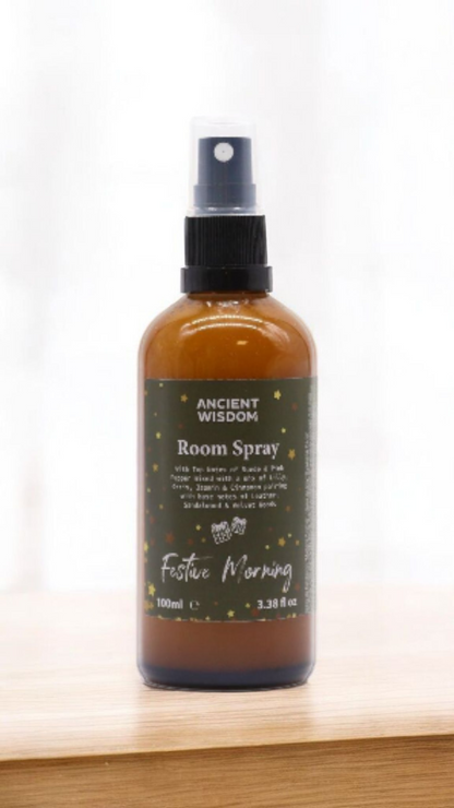 Festive Morning 100ml Christmas Room Spray, showcasing an elegant design, ideal for creating a warm festive atmosphere. This beautiful room spray is a delightful Christmas gift and stocking filler, offering a festive fragrance experience with notes of warm spice, cinnamon orange, and a touch of floral elegance. It's the ultimate home fragrance for aromatherapy and pampering during the winter season.