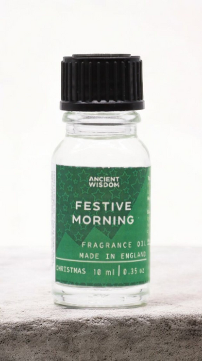 Festive Morning Fragrance Oil 10ml, a delightful essential for your holiday decorations. This festive fragrance is an excellent Christmas gift or stocking filler, bringing delightful scents of winter spice with cinnamon orange and frankincense myrrh. A must-have for home fragrance lovers, it adds a touch of warmth to your pamper pack, perfect for enjoying a white Christmas.
